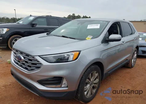 2022 Ford Edge Titanium z USA, uszkodzony, nr VIN 2FMPK4K96NBB05154